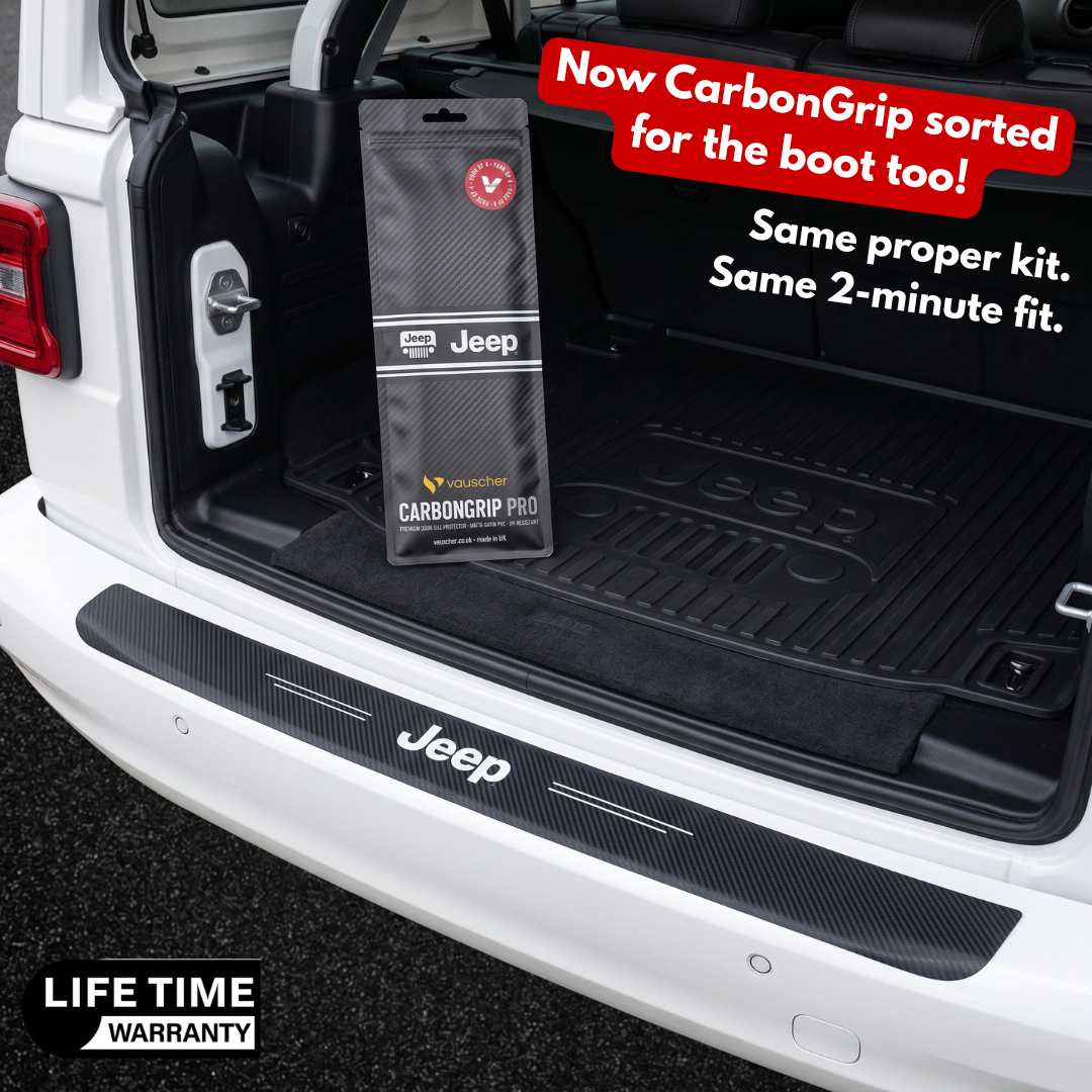 CarbonGrip PRO carbon fibre protector fitted on a car's rear boot sill, with its pack in the boot