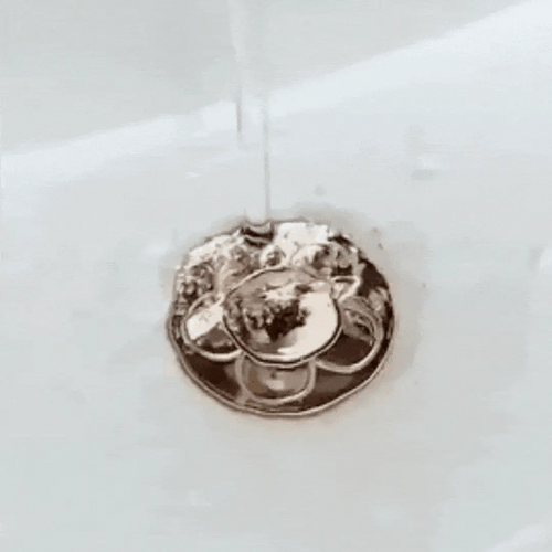 AquaStop ~ Pop-up Drain Stopper Prevents Hair Clogs in Bath & Shower