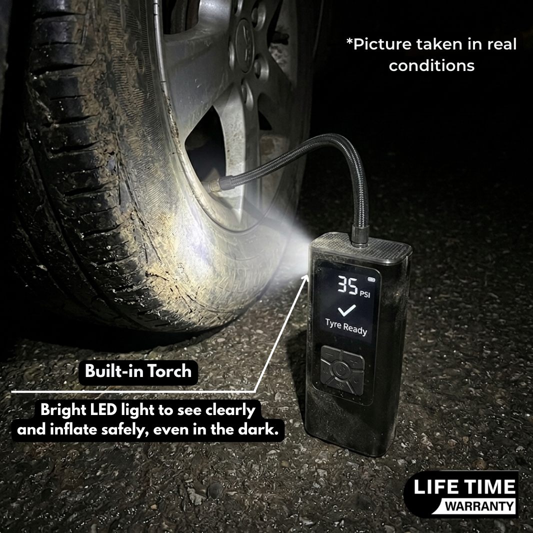 AirMate built-in LED torch lighting a car tyre at night, screen showing 35 PSI and Tyre Ready