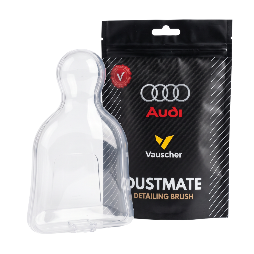 DustMate clear protective case next to the black DustMate pouch with an Audi logo