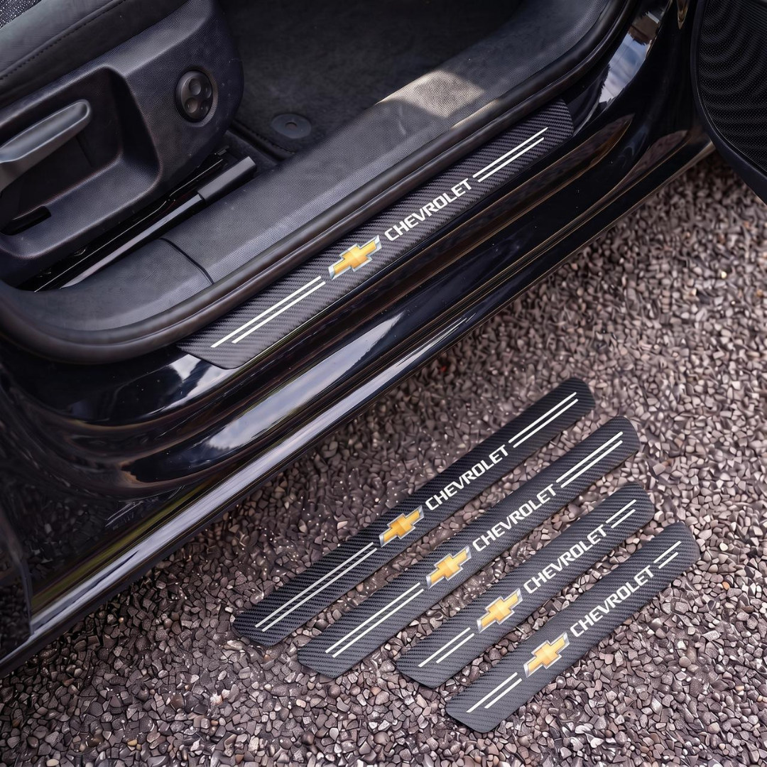 CarbonGrip PRO door sill protectors with Chevrolet logo: one fitted on the sill, set of 4 on the ground