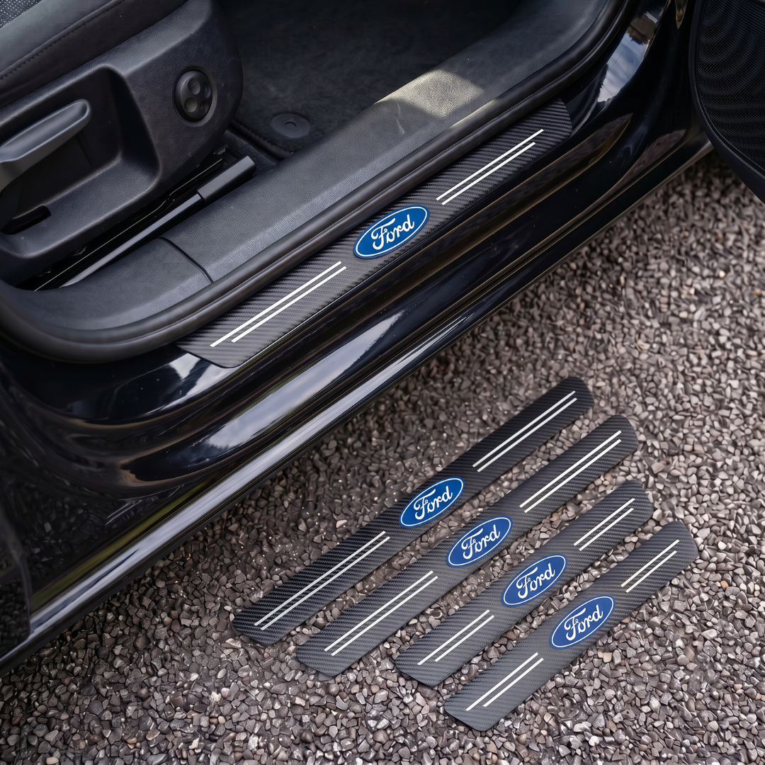 CarbonGrip PRO door sill protectors with Ford logo: one fitted on the sill, set of 4 on the ground