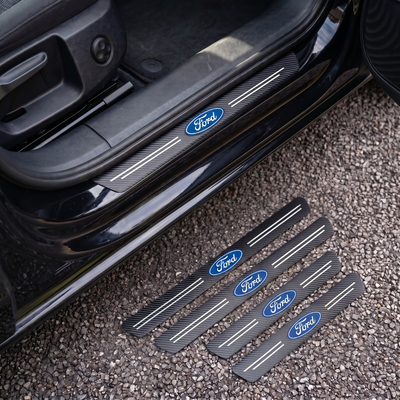 CarbonGrip PRO door sill protectors with Ford logo: one fitted on the sill, set of 4 on the ground