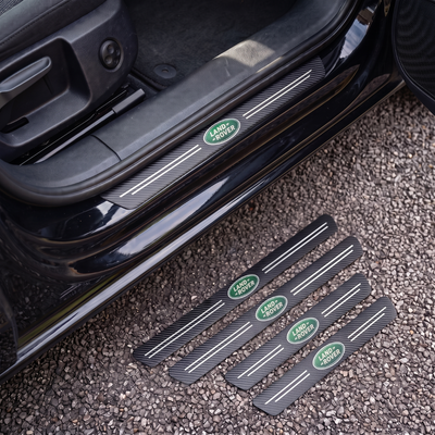 CarbonGrip PRO door sill protectors with Land Rover logo: one fitted on the sill, set of 4 on the ground