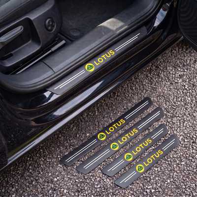 CarbonGrip PRO door sill protectors with Lotus logo: one fitted on the sill, set of 4 on the ground