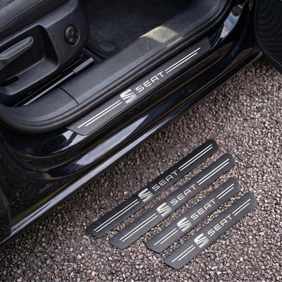 CarbonGrip PRO door sill protectors with Seat logo: one fitted on the sill, set of 4 on the ground